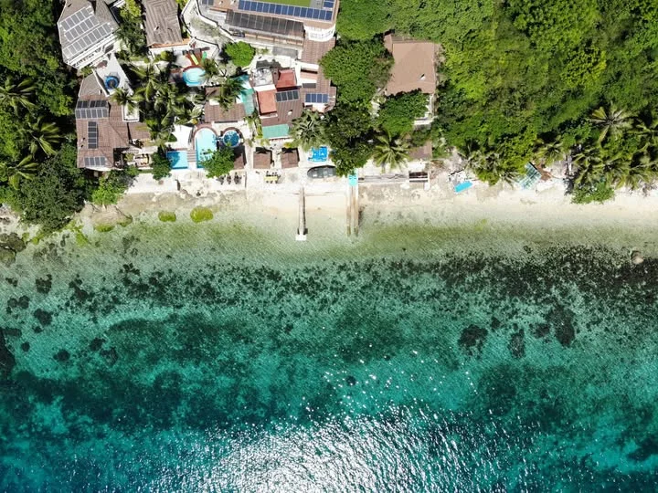 Seafari Resort Oslob perched on a cliffside, offering stunning sea views and serene ambiance.