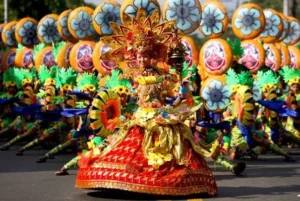 Sinulog Festival dance in Cebu with colorful costumes and flower props.